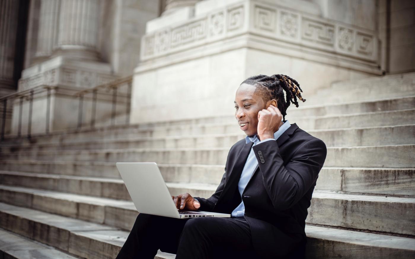 sitting on steps with phone